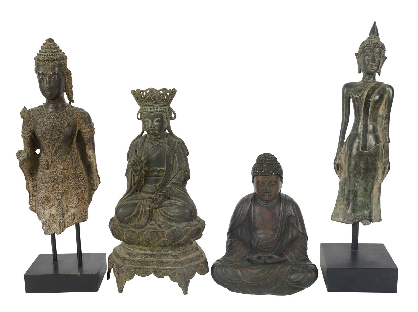 Group of Four Buddhistic Figures: two mounted to stands Smallest: 7 x 5 7/8 x 5 1/4 in. (17.8 x 14.9 x 13.3 cm.); Tallest overall: 14 x 3 5/8 x 3 5/8 in. (35.6 x 9.2 x 9.2 cm.) Provenance: Property from the Estate of Professor Harry S