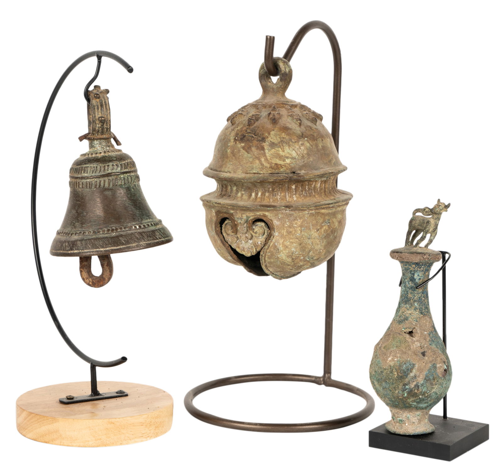Group of Archaic Bronzes: comprising an oval bell (6 1/2 x 4 1/2 in., Overall: 11 5/8 x 5 3/4 in.; another bell (5 3/4 x 3 1/2 in., Overall: 10 3/4 x 7 x 4 5/8 in.); and a bottle with animal figure top, with stand (6 1/2 in.,
