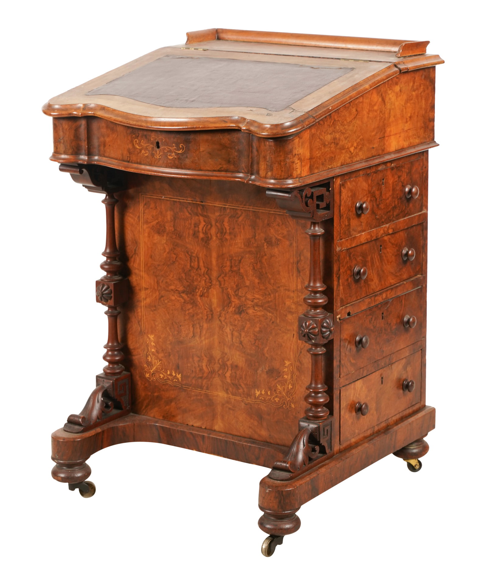 English Line-Inlaid Walnut Davenport Desk: 19th century; the hinged, leather-inset slant enclosing an undivided compartment, the case fitted with four drawers on the right-hand side opposing four false drawers on the left side 34 x 22 x 22 in.