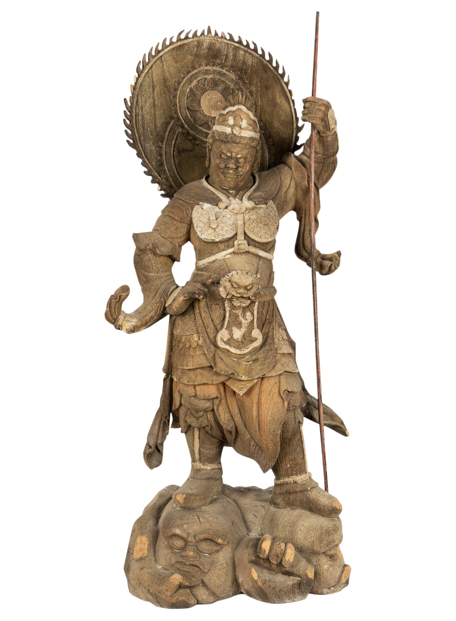 Japanese Carved Wood Figure of a Warrior: depicted standing on a grotesque base 26 x 11 x 10 in. (66 x 27.9 x 25.4 cm.) Provenance: Property from the Estate of Professor Harry Stone, Brentwood, California. Recipient of a Guggenheim Fellowship