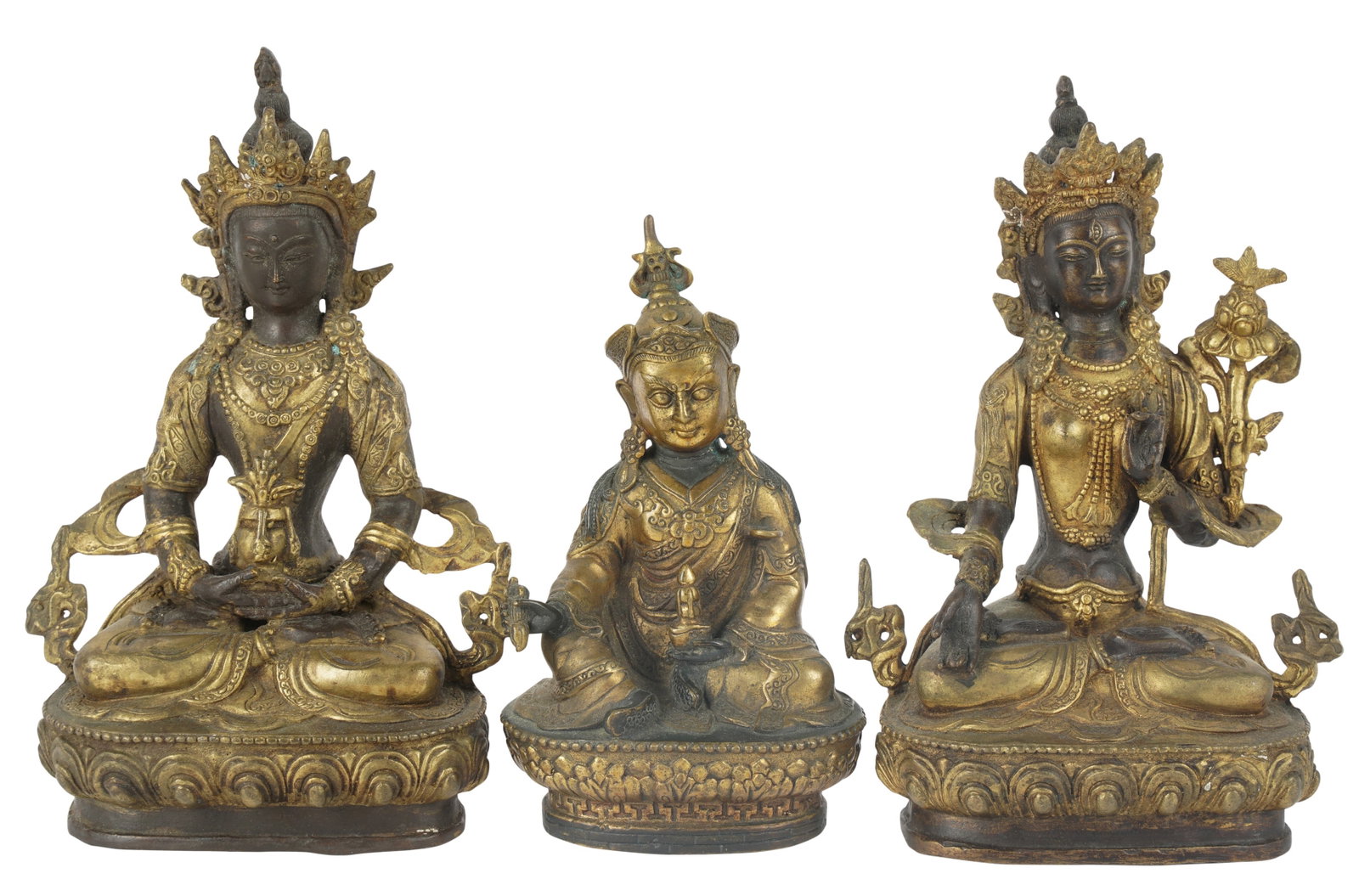 Group of Tibetan Gilt Bronze Figures: [3 pieces] The pair: unsigned, 8 1/2 x 5 1/2 x 3 1/2 in. (21.6 x 14 x 8.9 cm.), The other: marked to base, 6 1/2 x 4 x 2 1/2 in. (16.5 x 10.2 x 6.4 cm.) Provenance: Property from the Estate of Profess