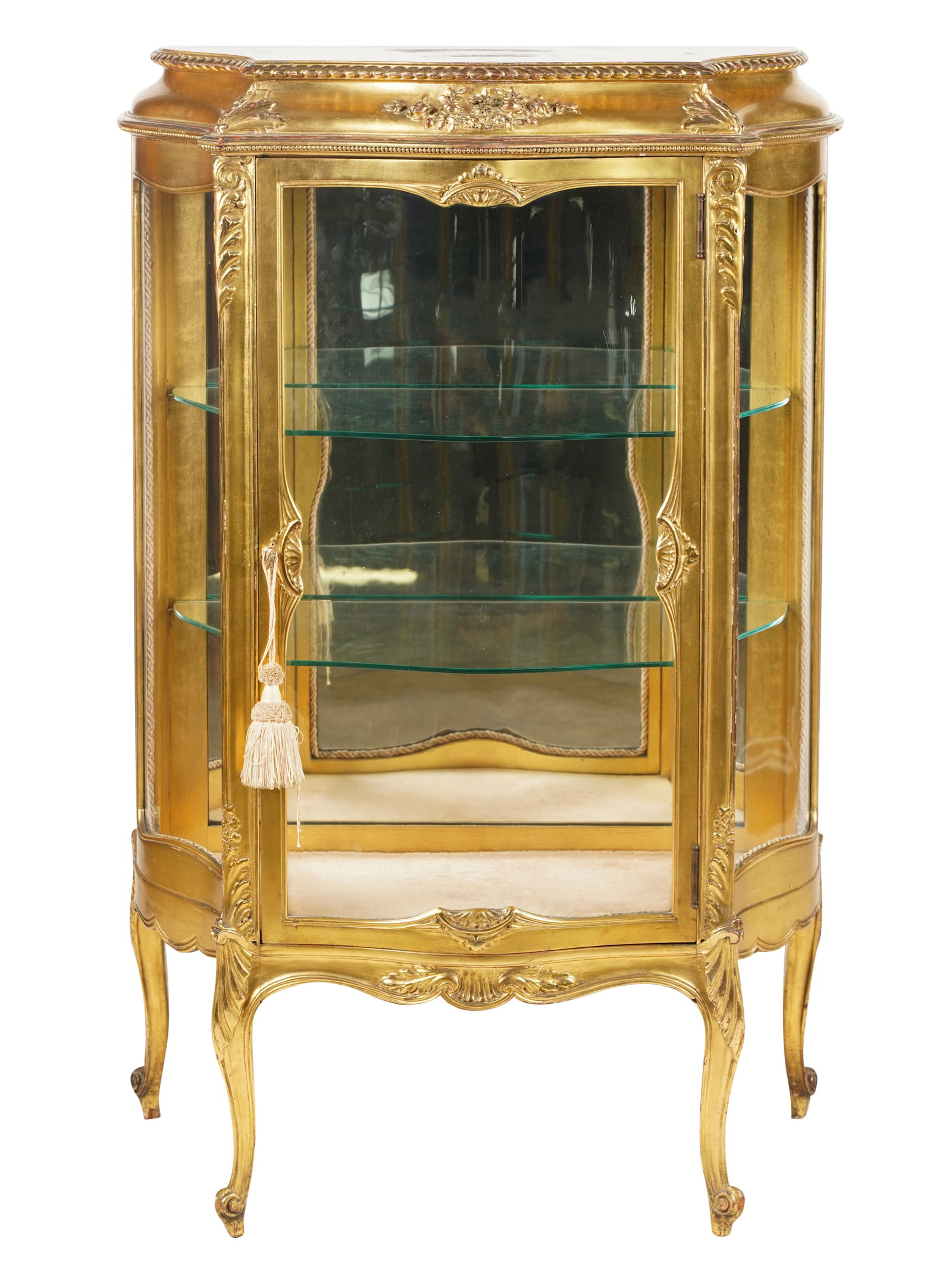Louis XV-Style Giltwood Vitrine Cabinet: with glass shelves and mirrored rear panel 48 x 32 x 14 1/2 in. (121.9 x 81.3 x 36.8 cm.)
