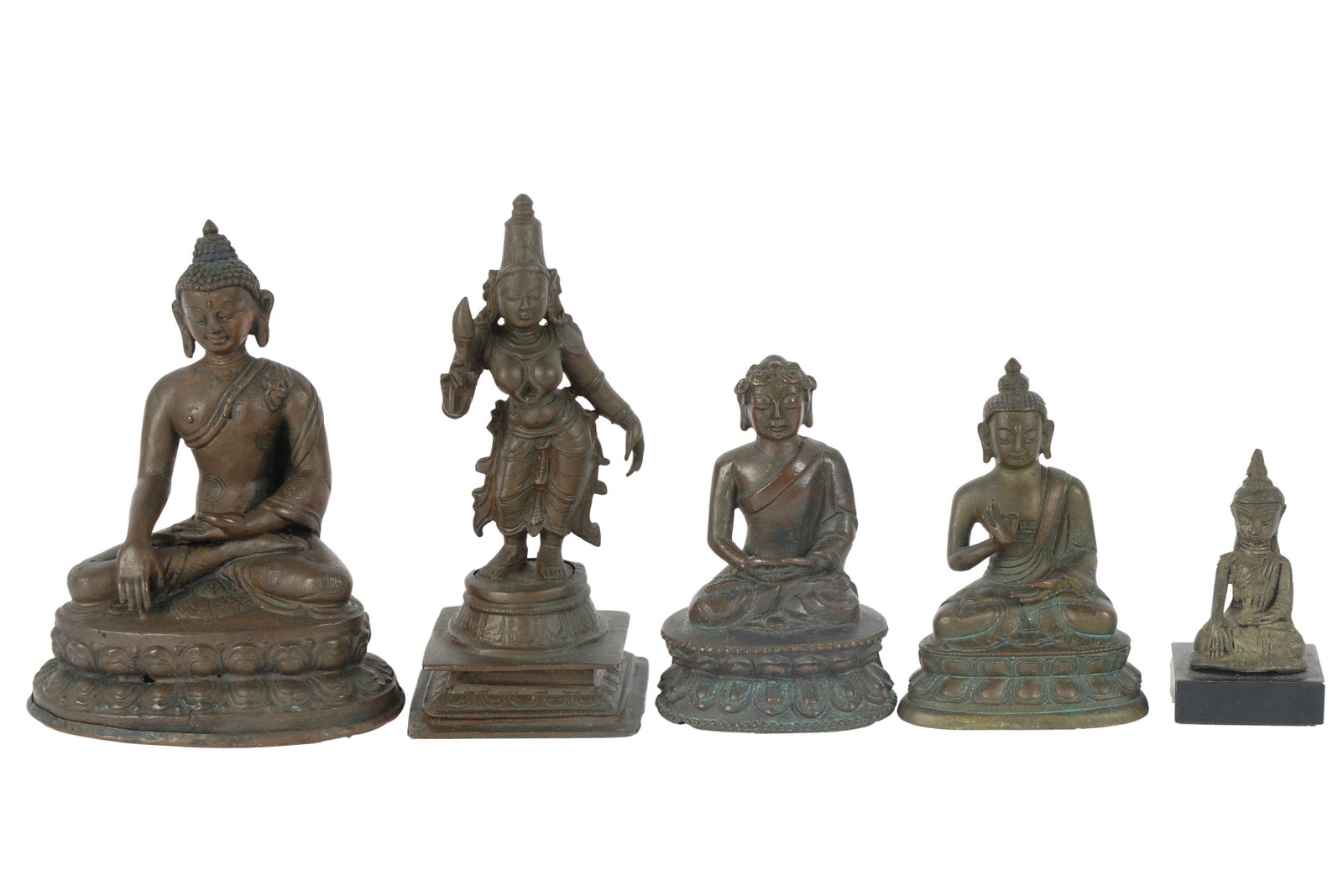 Group of Tibetan Bronze Figures: [5 pieces] Ranging from 5 1/2 in. (14 cm.) to 2 1/2 in. (6.4 cm.) high Provenance: Property from the Estate of Professor Harry Stone, Brentwood, California. Recipient of a Guggenheim Fellowship in the