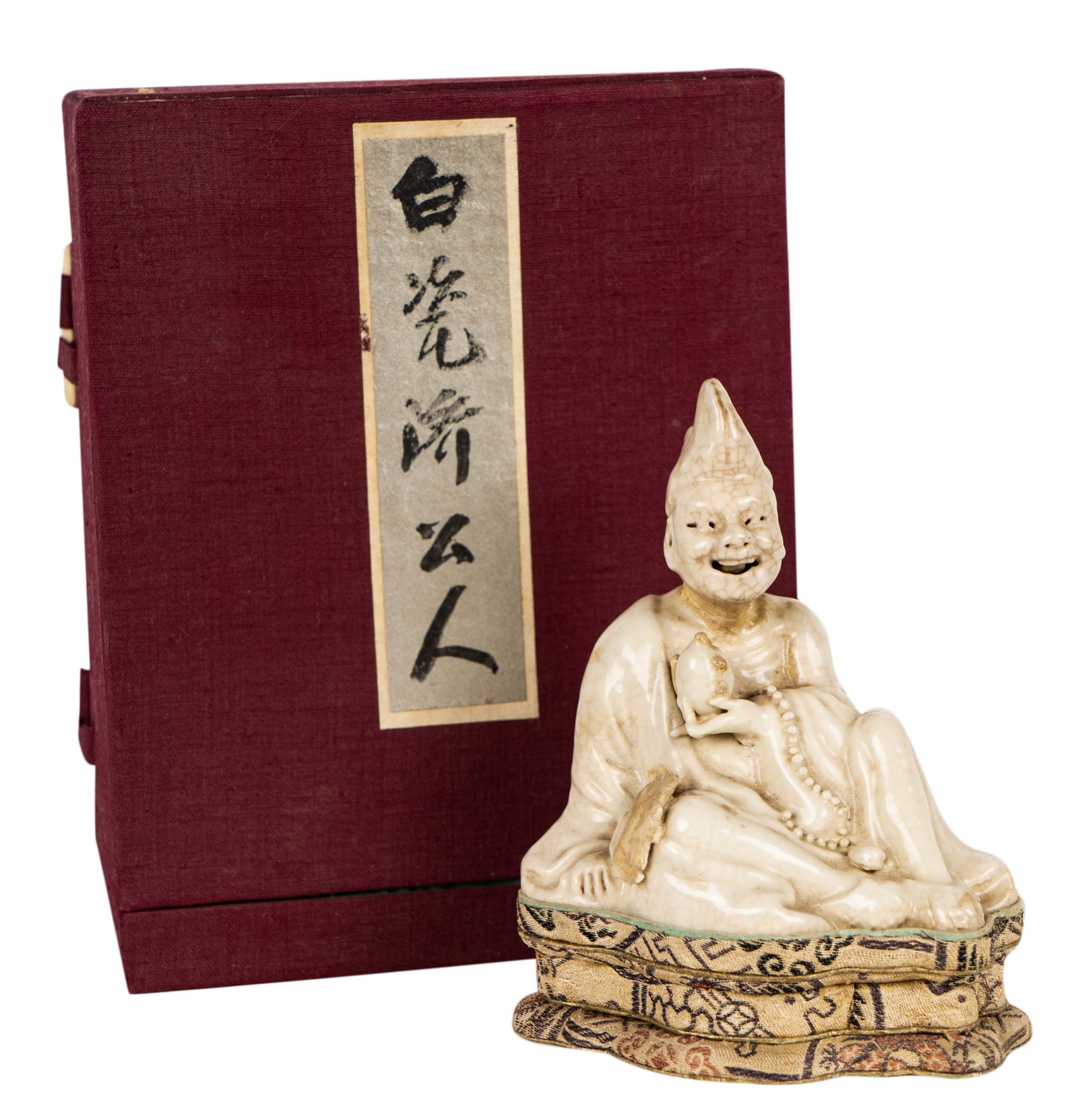 Asian Porcelain Seated Figure (1 of 11)