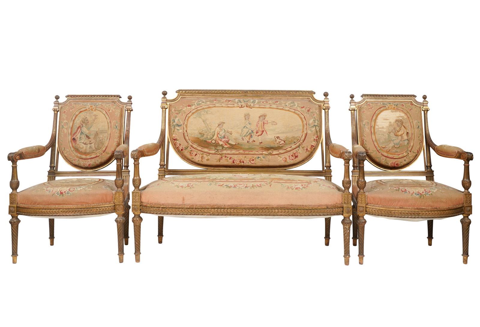 Neoclassical-Style Giltwood and Tapestry Salon Suite: 19th century comprising a canape, 38 x 47 x 21 in. (96.5 x 119.4 x 53.3 cm.), Seat height: 16 in. (40.6 cm.) and pair of fauteuils, 38 x 25 x 20 in. (96.5 x 63.5 x 50.8 cm.), Seat height: 16 in. (40.6