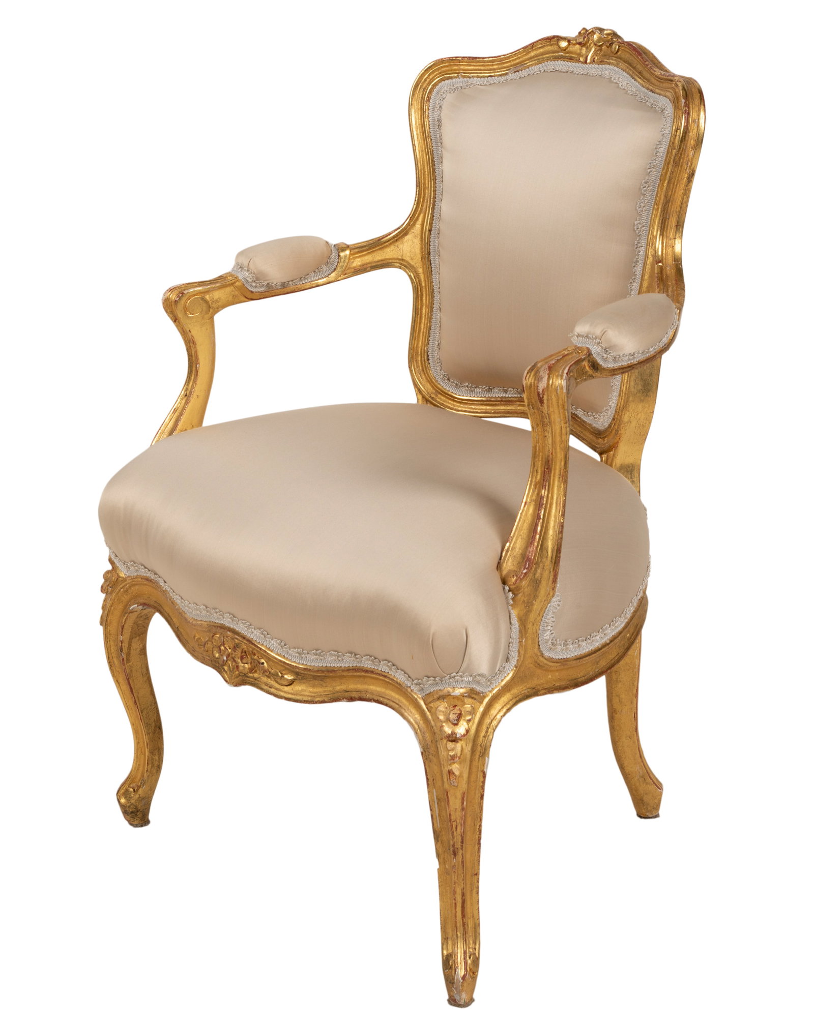 Diminutive Louis XV-Style Giltwood Fauteuil: covered with silk with passementerie trim 25 1/4 x 16 7/8 x 17 1/2 in. (64.1 x 42.9 x 44.5 cm.), Seat height: 13 in. (33 cm.) Provenance: Property from a Wilshire Corridor Penthouse Estate, Los Angele