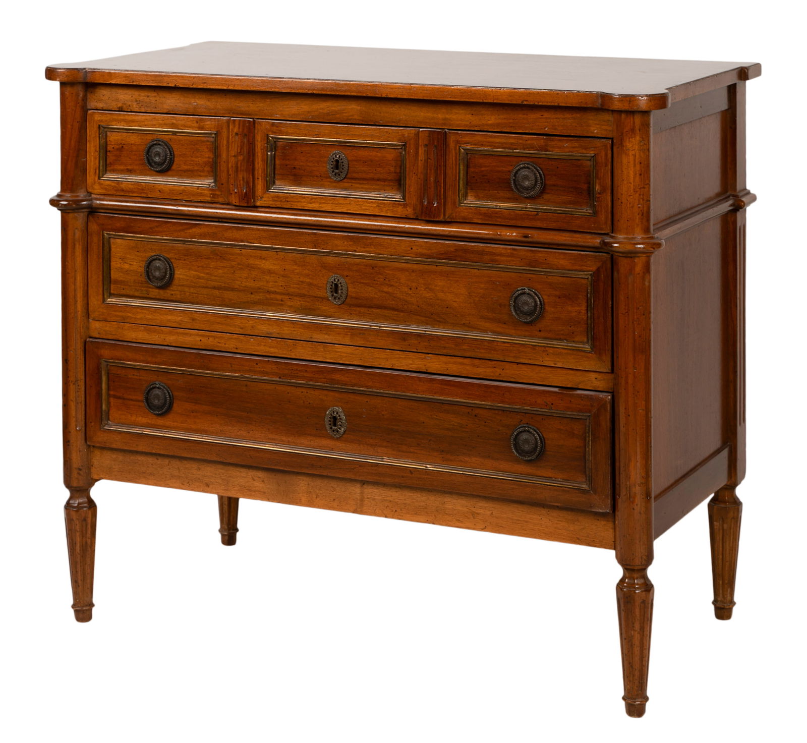 Continental Neoclassical-Style Commode: with five drawers 31 x 36 x 18 1/2 in. (78.7 x 91.4 x 47 cm.) Provenance: Property from a Wilshire Corridor Penthouse Estate, Los Angeles, California