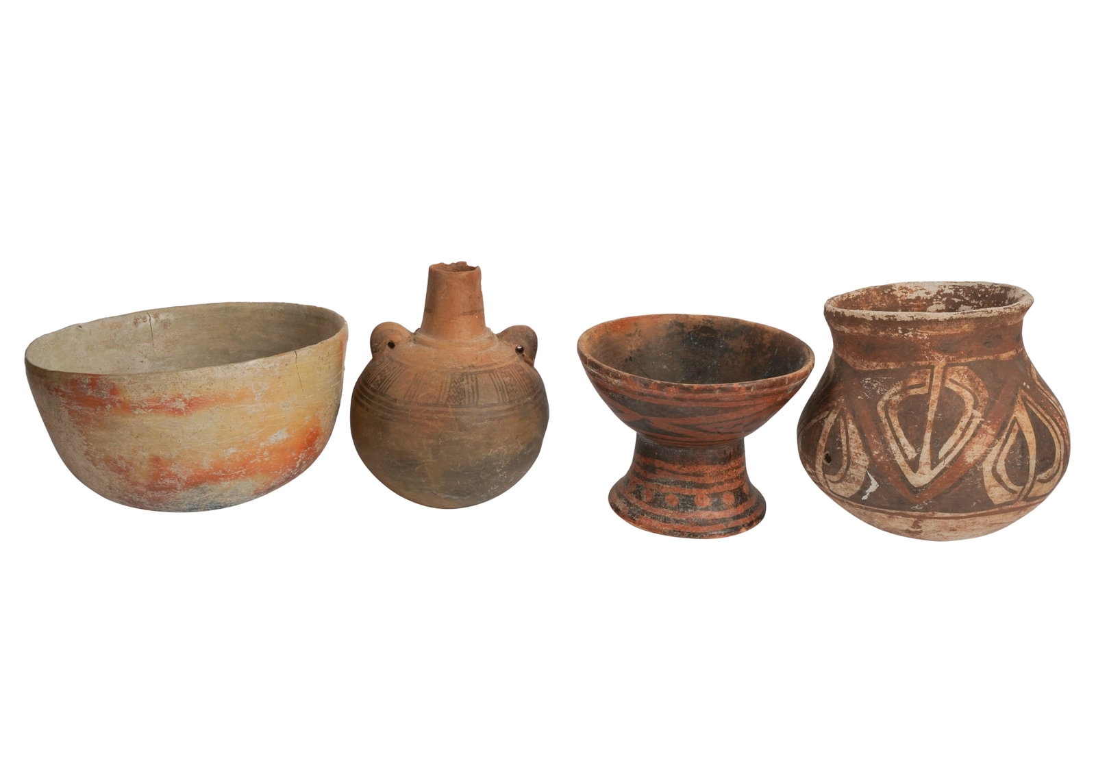 Group of Pre-Columbian Vessels: [4 pieces] 4 x 7 1/4 in., 6 x 5 in., 4 x 5 1/2 in., and 6 x 6 in. Provenance: Property from an Old Mission Road Estate, Santa Barbara, California