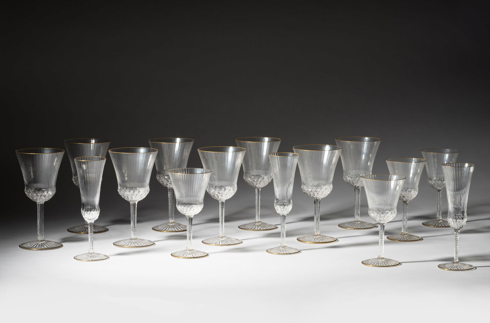 Saint Louis Crystal Drinks Service: "Apollo Gold" pattern; comprising 8 water goblets (7 3/8 in. high), 6 burgundy wine (6 3/8 in. high), and 4 champagne flutes (7 3/8 in. high) Provenance: Property from a Wilshire Corridor Penthouse Es