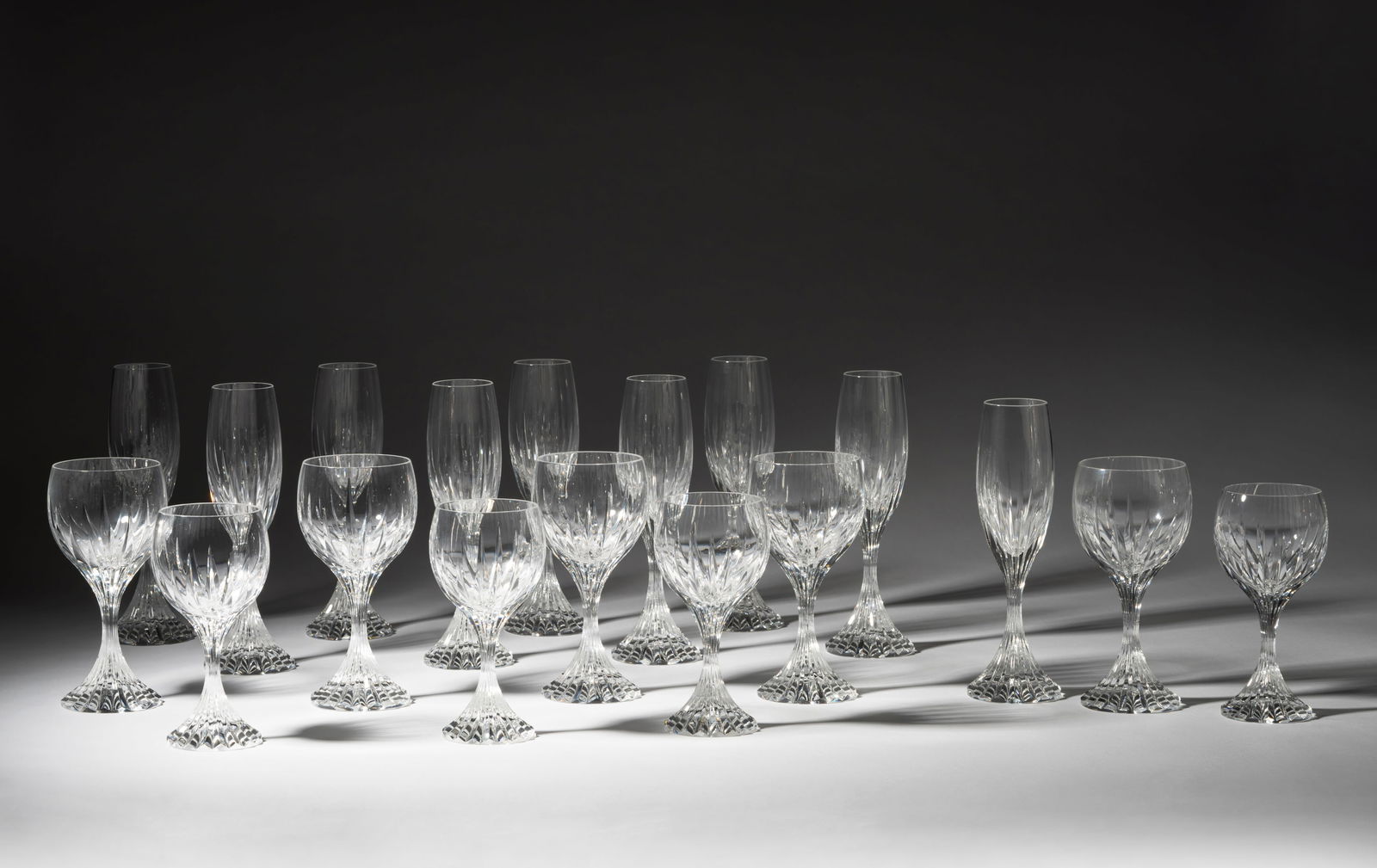 Baccarat Crystal Stemware Service: "Massena" pattern; comprising 12 champagne flutes (8 1/2 in. high); 12 water goblets (6 7/8 in. high); and 12 claret wine (6 3/8 in. high)