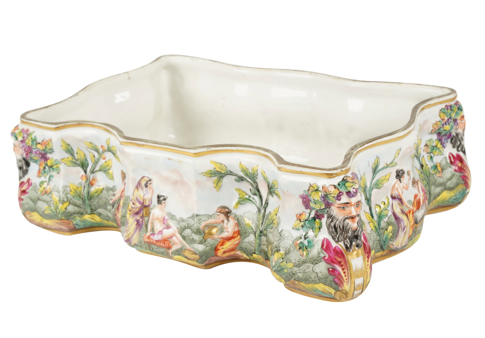 Capodimonte Porcelain Jardiniere: blue crowned "N" mark; retailed by B. Altman and Co. 4 1/2 x 14 x 10 in. (11.4 x 35.6 x 25.4 cm.) Provenance: The Walter and Donna Conn Estate; located within the desirable estate enclave of San Marin