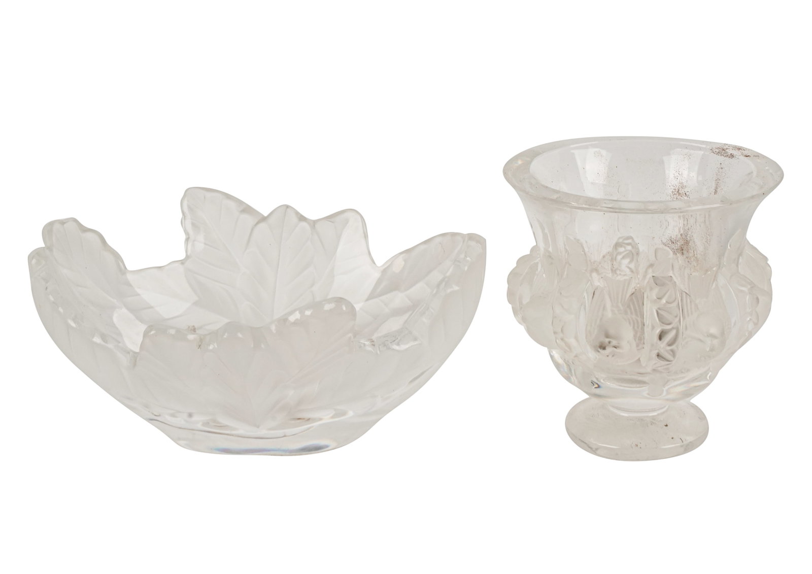 Two Pieces of Lalique Glass: each signed "Lalique France"; the "Compiegne" oval bowl: 3 5/8 x 7 3/4 x 6 in. (9.2 x 19.7 x 15.2 cm.), the "Dampierre" flower vase: 4 3/4 x 4 5/8 in. (12.1 x 11.7 cm.) Provenance: The Walter and Donn