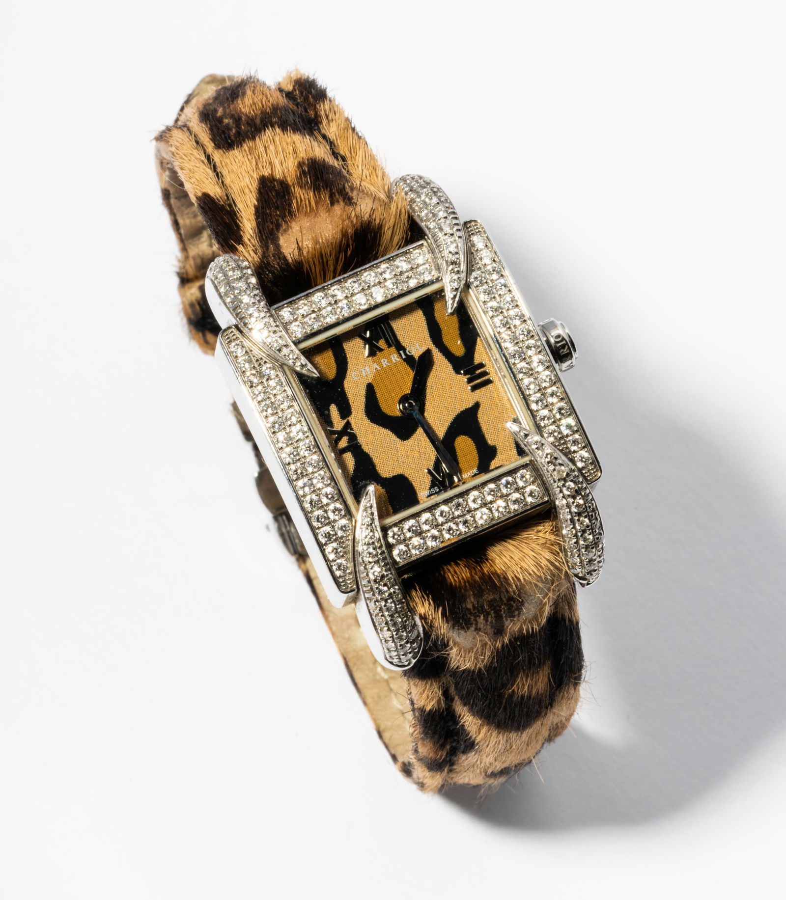 Charriol Stainless Steel and Diamond Leopard Print Wristwatch: Philippe Charriol stainless steel quartz movement wristwatch with square 15.00 x 15.00 mm. leopard pring dial surrounded by a diamond set bezel with 180 full cut round Diamonds [I/VS], approximate tot