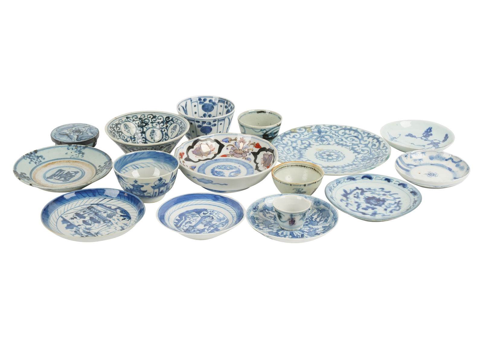 Group of Chinese Blue and White Porcelain Plates and Bowls: various patterns Ranging from 2 x 7 in. (5.1 x 17.8 cm.), to 1 1/2 x 2 in. (3.8 x 5.1 cm.) [15 pieces] Provenance: Property from the Estate of Gordon F. Taylor, an employee of the San Francisco Opera