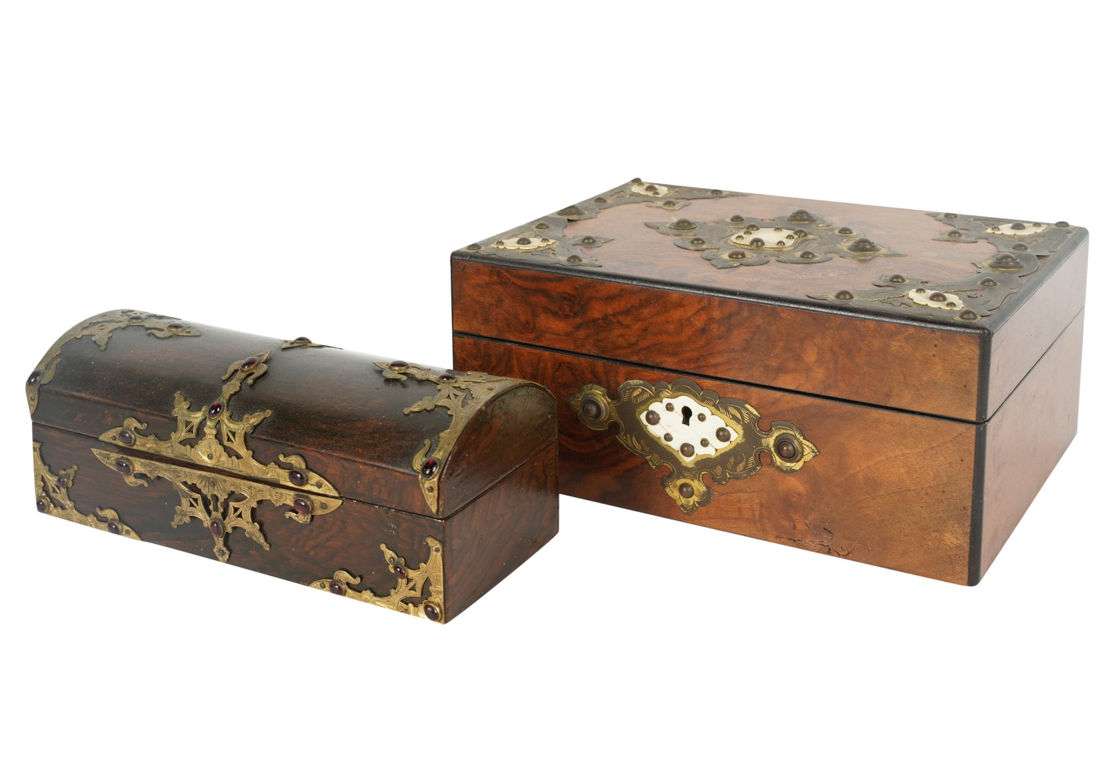 Two Gilt Metal-Mounted Table Boxes: 19th century; the domed box with red colored glass "jewels", 3 1/4 x 9 1/2 x 3 3/4 in. (8.3 x 24.1 x 9.5 cm.); the other embellished with bone, 4 3/4 x 10 3/4 x 7 3/4 in. (12.1 x 27.3 x 19.7 cm.) Prov