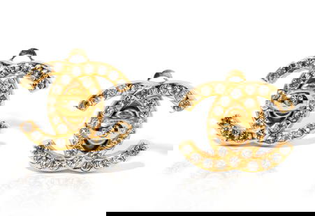 Chanel Gold-tone and Rhinestone ?CC? Earrings: Gold-tone "Chanel" interlocking "C" motif earrings with clip backs, set with 62 round near colorless Rhinestones, 1.50 mm. to 2.00 mm. each in diameter, 9.7 grams, 21.00 x 16.00 mm. each in diameter