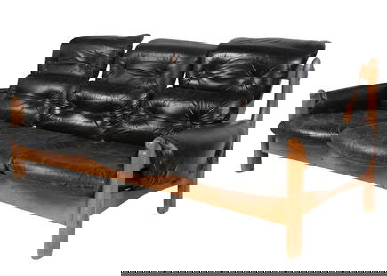 Mid-Century Safari-Style Sofa: in the style of Sergio Rodriguez; 1960s; black leather, stained wood 32 x 75 x 34 in. (81.3 x 190.5 x 86.4 cm.), Seat height: 14 in. (35.6 cm.)