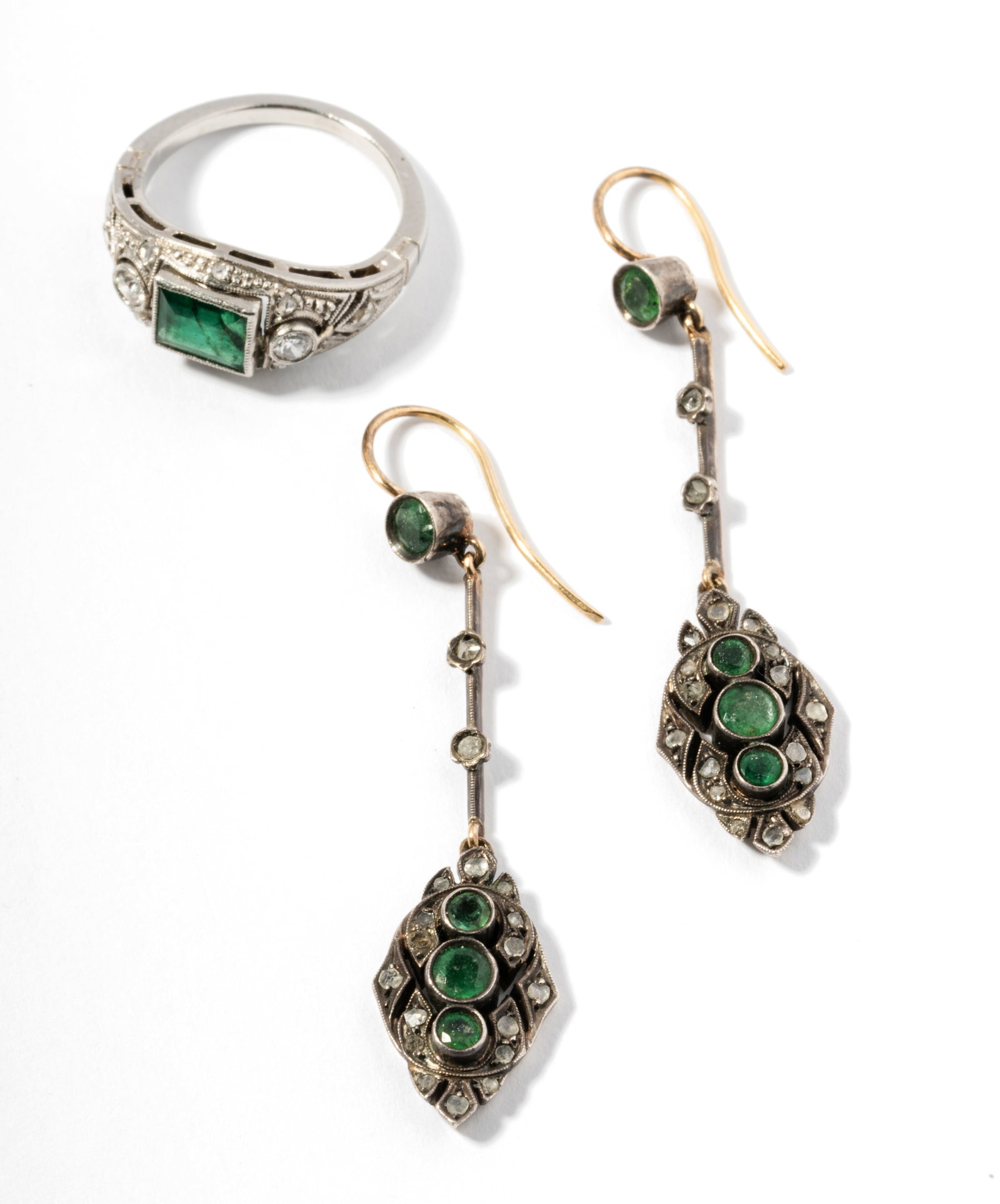 Platinum Emerald and Diamond Ring and Pair of 10 Karat and 18 Karat Yellow Gold Earrings: Including a platinum ring center bezel set with one emerald cut Emerald, approximately 0.77 carats, accented with two Old European cut Diamonds [G/VS], approximate total weight 0.14 carats, further en