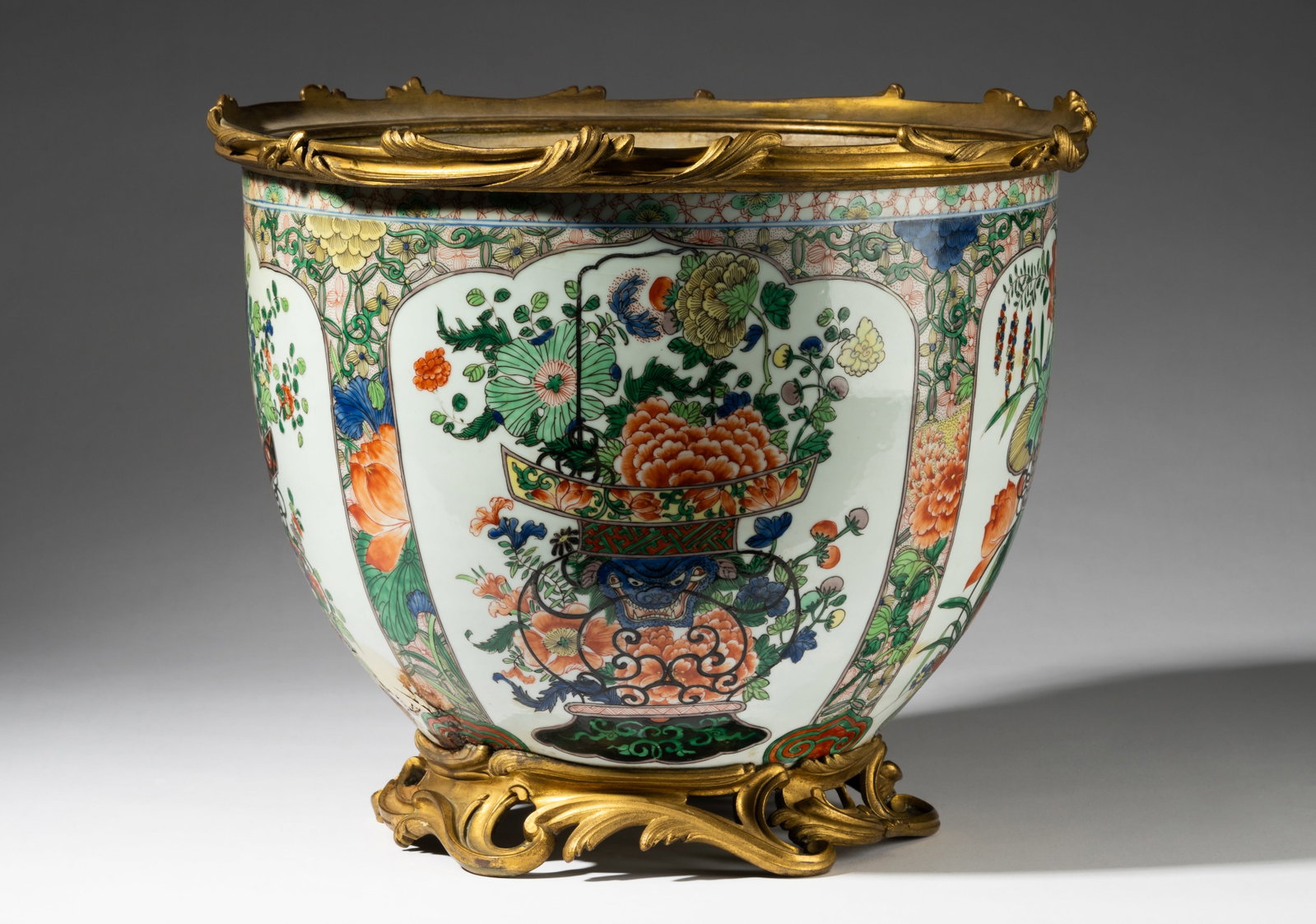 Gilt Bronze-Mounted Chinese Famille Verte Porcelain Jardiniere: unmarked 12 1/2 x 15 1/4 in. (31.8 x 38.7 cm.) Provenance: Property from the Dr. Levinson Estate, Los Angeles, California
