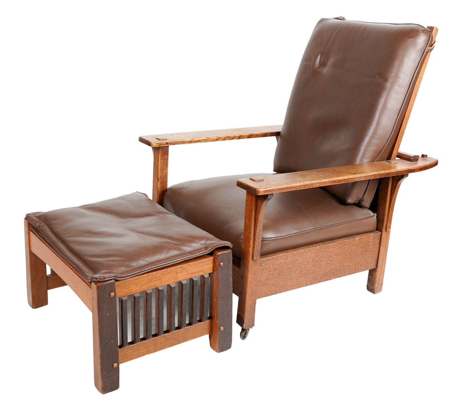L & JG Stickley Morris Chair: the chair with branded mark to rear seat rail "The Work of L [and] JG Stickley", with later replaced brown leather seat and back cushions; together with a later ottoman with branded signature "Whit Me