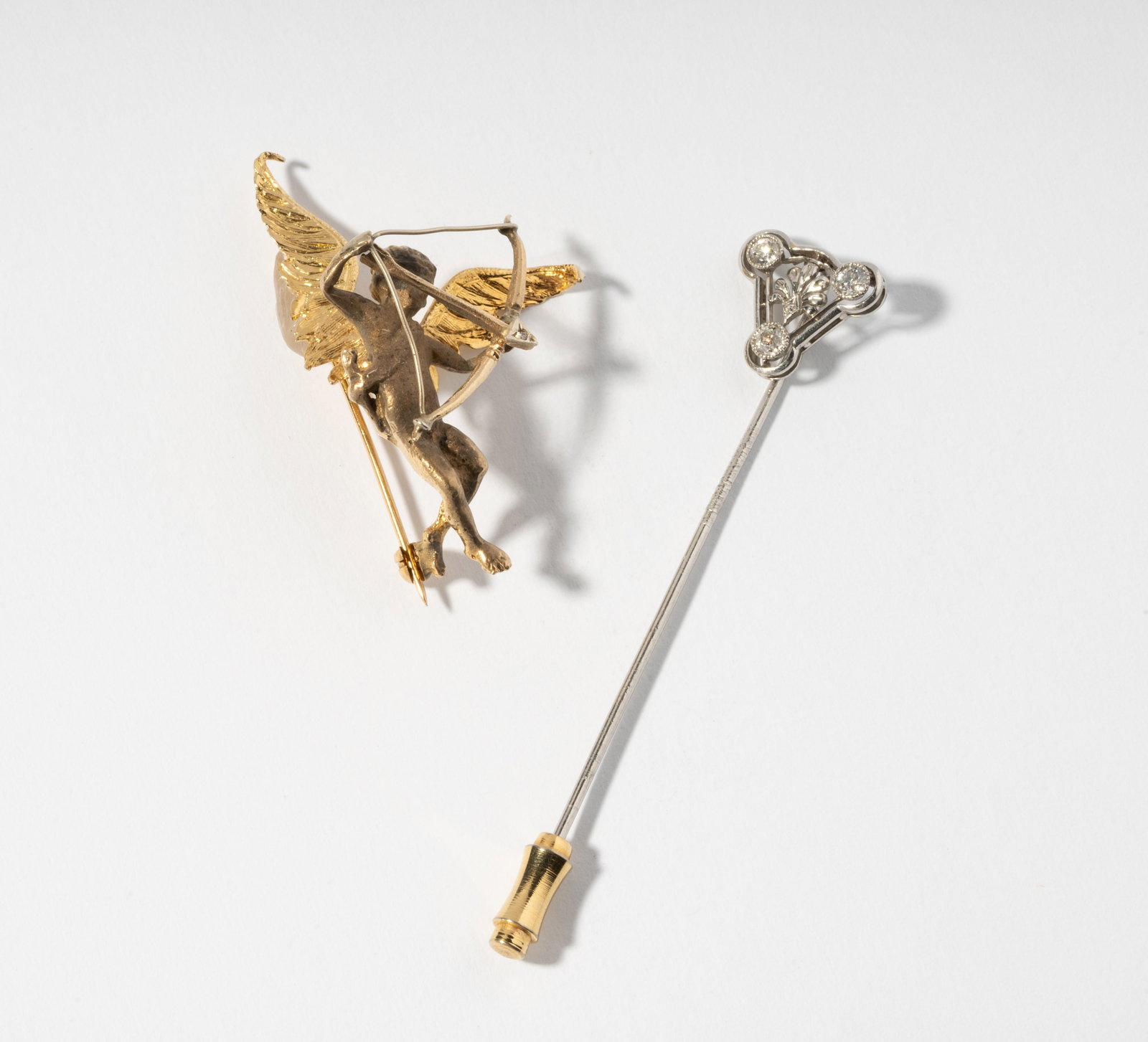 Gold Cupid Brooch, And Platinum And Diamond Stick Pin (1 of 6)