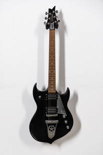 Silvertone Paul Stanley Sovereign Black Sparkle Electric Guitar with Soft Case: 2003, model PSSN1 41 x 13 1/4 x 2 in. (104.1 x 33.7 x 5.1 cm.) Provenance: The Private Collection of Robin Chretien, founder of Robin's Jean