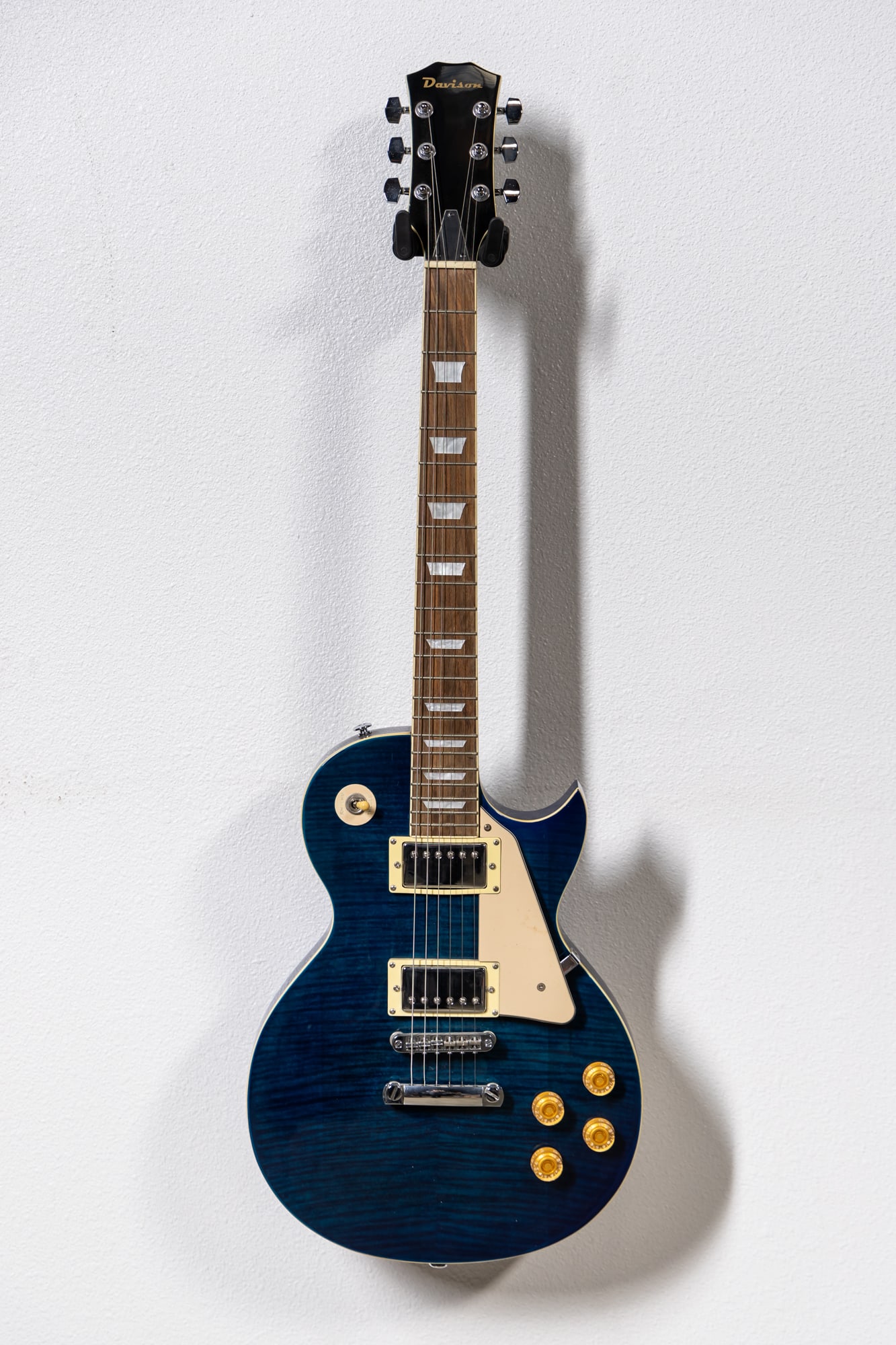 Davison Blue Sunburst Les Paul Standard Electric Guitar with Soft Case: 2007, with abalone binding trim, pearl inlaid, solid body and flame maple top, right-handed, 39 x 13 x 3 in. (99.1 x 33 x 7.6 cm.) Provenance: The Private Collection of Robin Chretien, founder of Robi