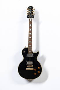 Epiphone Les Paul Gibson Custom Pro Electric Guitar: made in Korea, right-handed, 6-string, and solid mahogany body 39 1/2 x 12 3/4 x 2 3/4 in. (100.3 x 32.4 x 7 cm.) Provenance: The Private Collection of Robin Chretien, founder of Robin's Jean