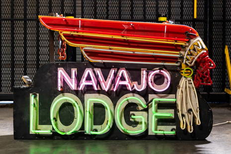 Vintage Navajo Lodge Neon Sign: with hanging chains to the top, one-sided, standard electrical outlet, and painted metal 30 x 54 x 11 in. (76.2 x 137.2 x 27.9 cm.) Provenance: The Private Collection of Robin Chretien, founder of