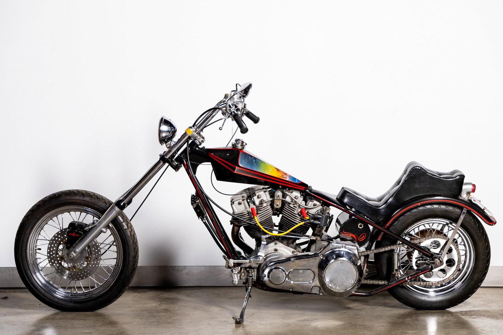 1976 Harley Davidson Chopper FXE - 1200: 1976, engine # 9D17854H6, with custom-painted female nude, mileage: 2,962 [1200cc] 47 x 103 in. (119.4 x 261.6 cm.) Provenance: The Private Collection of Robin Chretien, founder of Robin's Jean; To vi