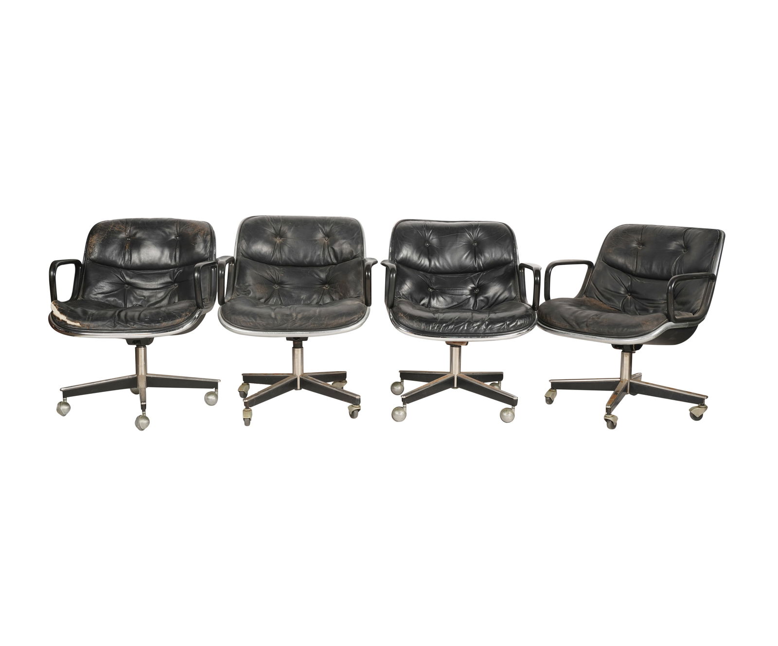 Charles Pollock for Knoll: Four Executive Chairs: plastic, black leather, enameled steel, chromed steel, enameled aluminum 31 x 26 1/2 x 23 in. (78.7 x 67.3 x 58.4 cm.), Seat height: 19 in. (48.3 cm.) Provenance: Estate of Thomas Cy Mouradick, Newpor
