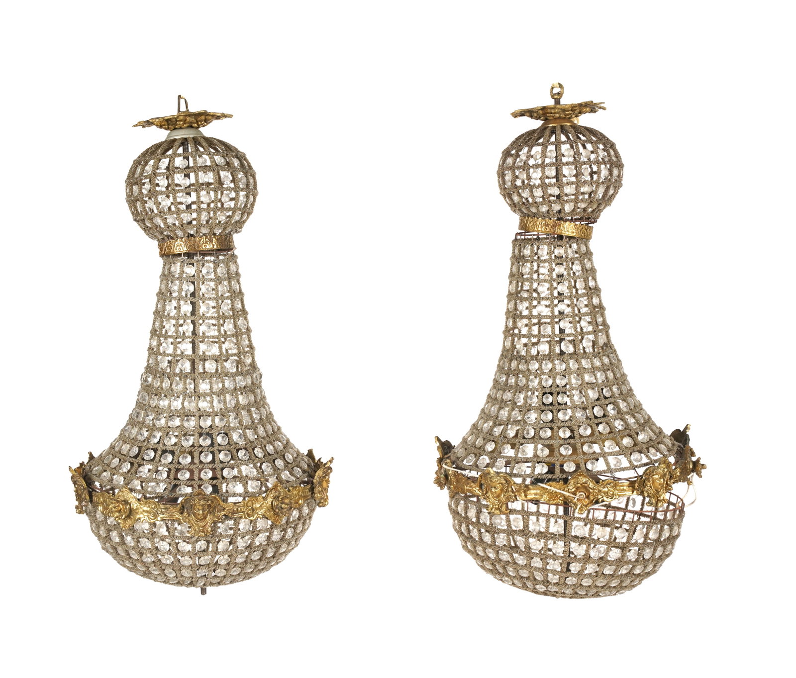 Pair of Glass and Gilt Metal Chandeliers: strung with clear glass beads on a frame wrapped with silver-colored beads 32 x 16 in. (81.3 x 40.6 cm.)