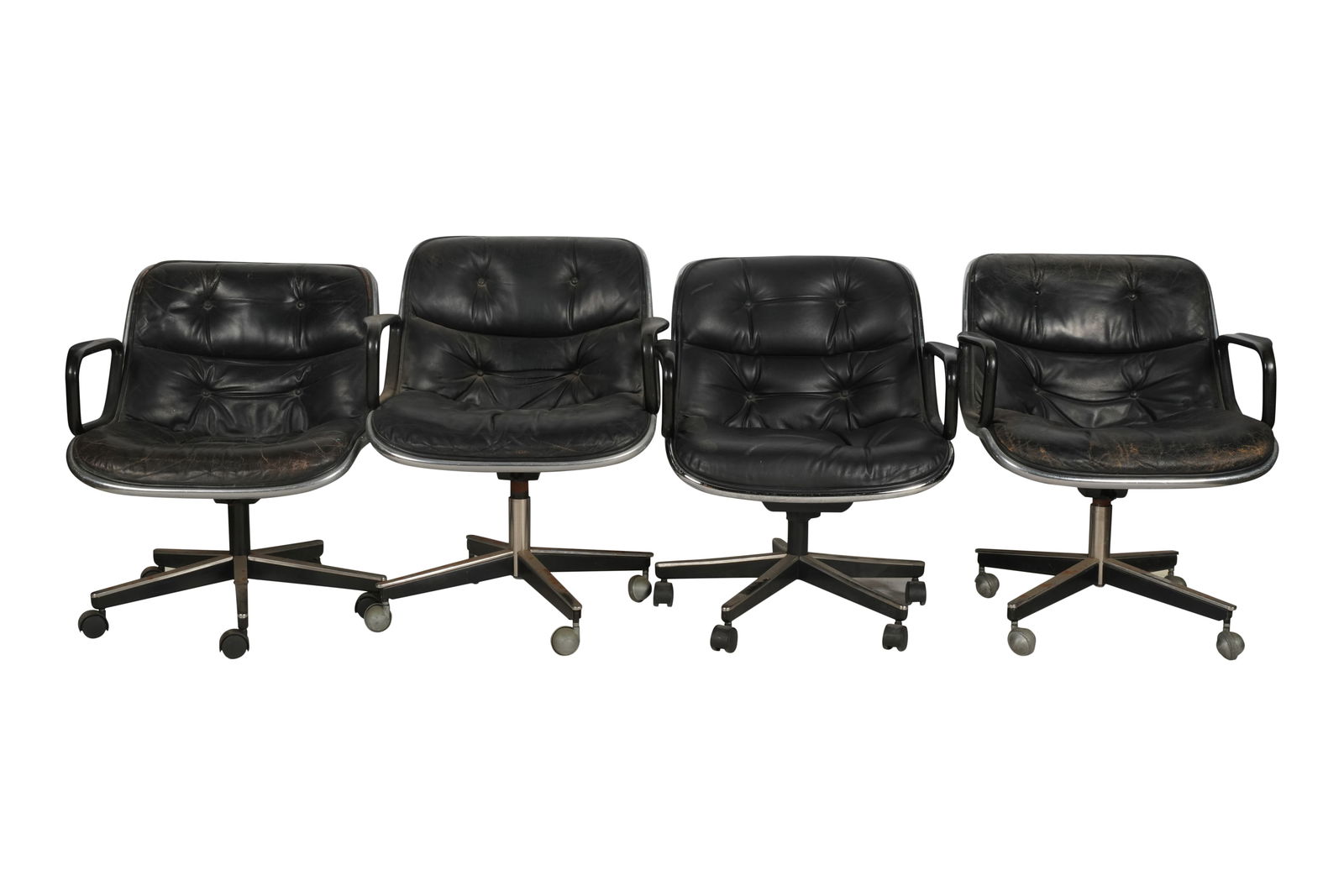 Charles Pollock for Knoll: Set of Four Executive Chairs: leather, plastic, chromed steel, enameled steel 32 x 26 x 25 in. (81.3 x 66 x 63.5 cm.), Seat height: 18 in. (45.7 cm.) Provenance: Estate of Thomas Cy Mouradick, Newport Beach