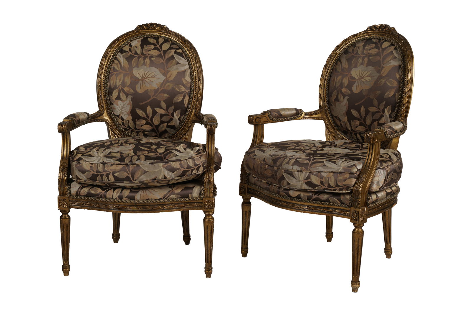 Pair of Louis XVI-Style Fauteuils: covered with brown floral fabric 38 x 24 x 22 in. (96.5 x 61 x 55.9 cm.), Seat height: 18 in. (45.7 cm.)