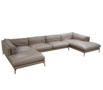 Giorgio Soressi for Design Within Reach: Sectional Sofa: "Como"; leather, steel; comprising a right-facing chaise and a left-facing chaise (each 27 1/4 x 79 x 44 in.) and an armless section (26 x 76 x 42 in.); with manufacturer's label "Made in Italy" [3 pi