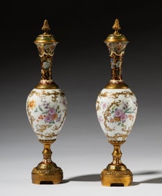 Pair of Continental Porcelain and Champleve Enamel Covered Vases