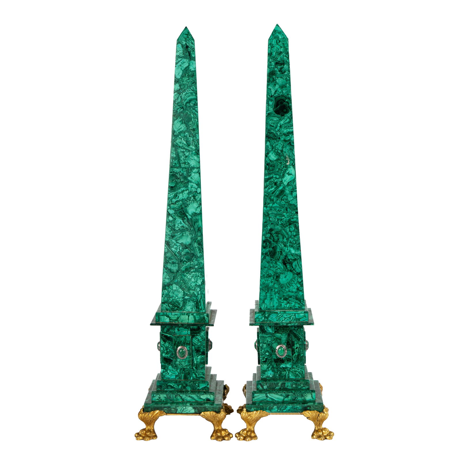 Pair of Malachite-Veneered Obelisks: late 20th/21st century; each on gilt metal base 32 1/4 x 7 3/4 x 7 3/4 in. (81.9 x 19.7 x 19.7 cm.)