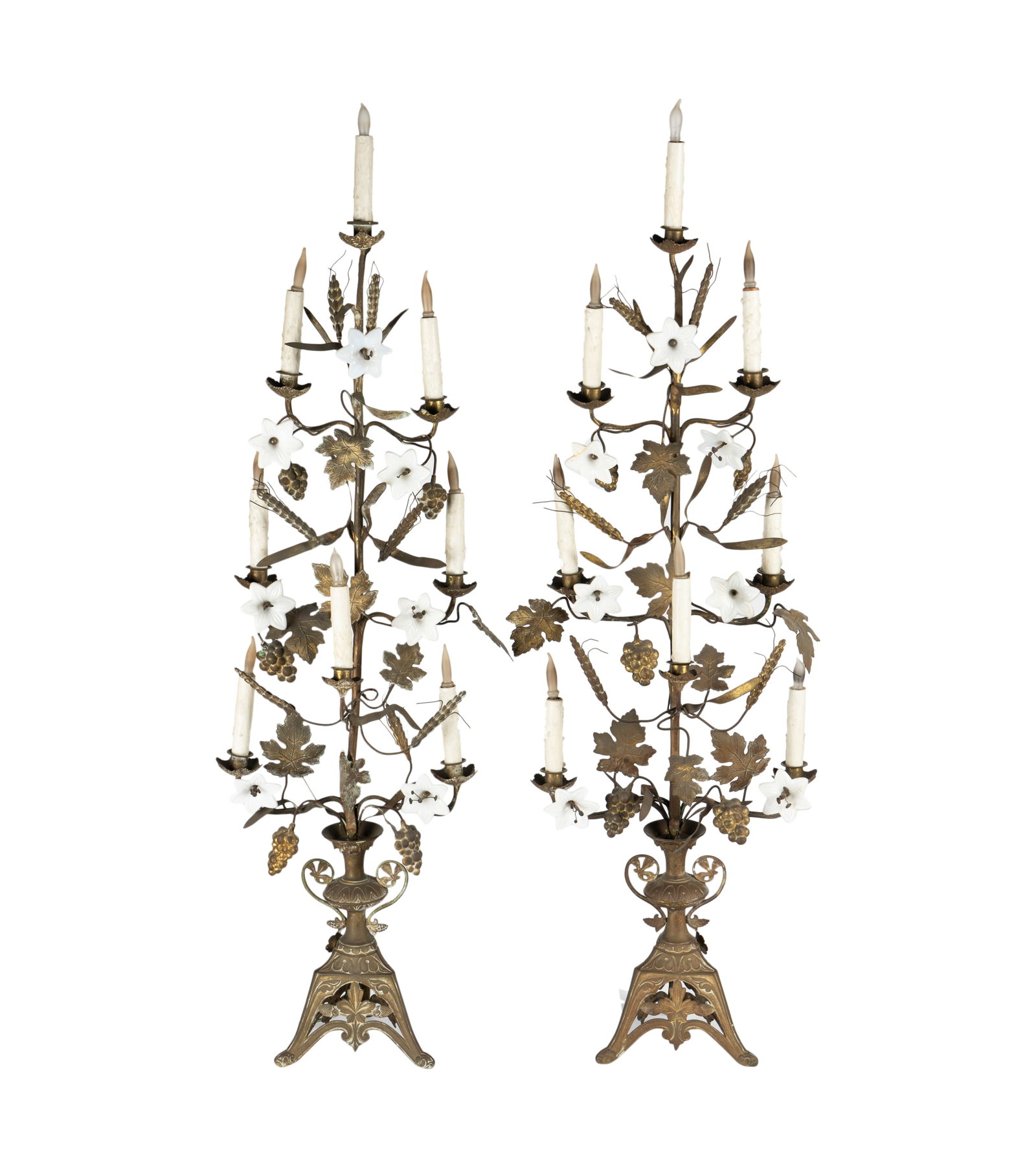 Pair of Gilt Metal Six-Light Girandoles: each formed as a bouquet rising from an urn Each: 49 1/2 x 16 x 11 in. (125.7 x 40.6 x 27.9 cm.) Provenance: From the Estate of Baroness Adelle Karoff, Los Angeles, CA, a collector of the French decor