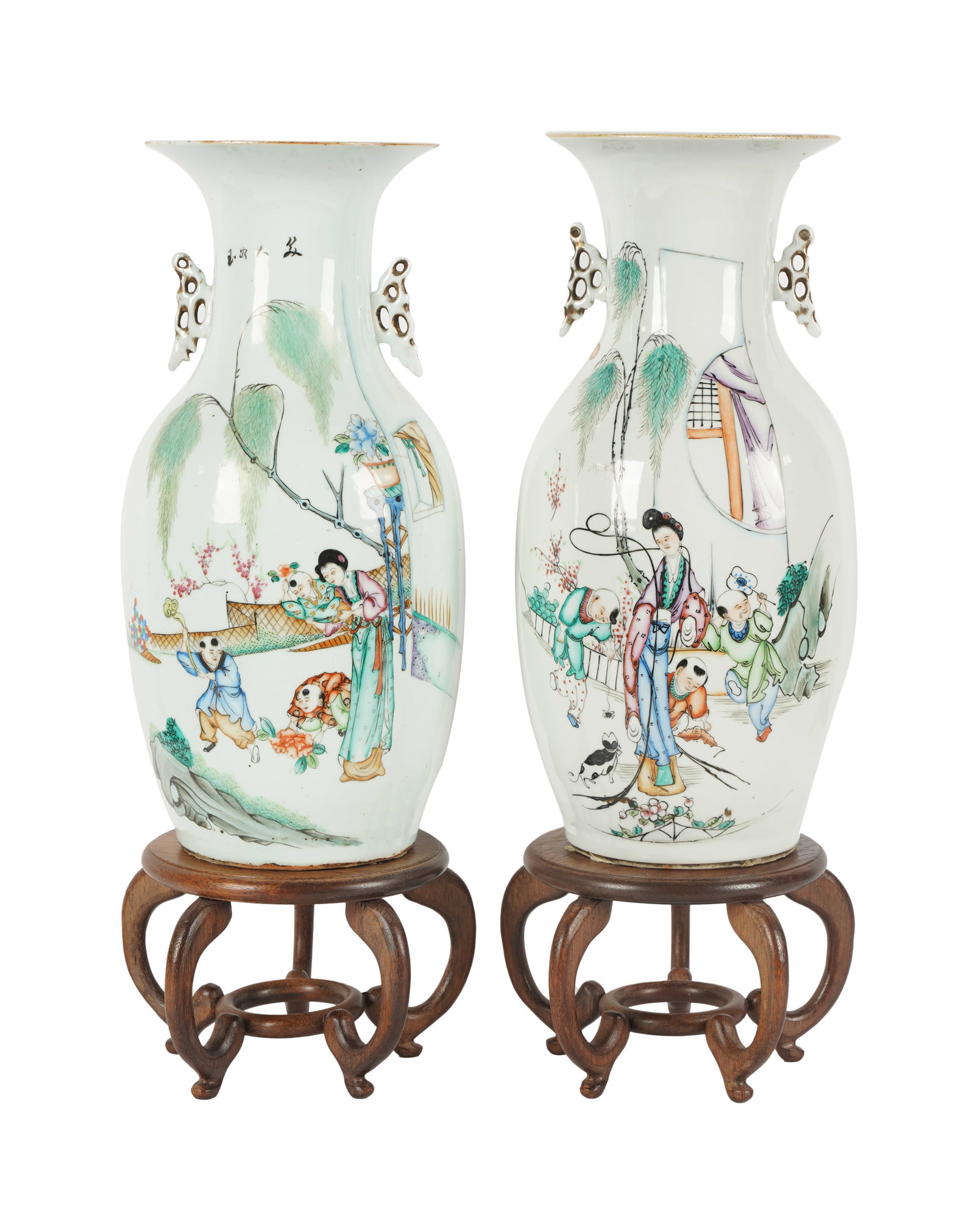 Pair of Chinese Porcelain Vases: resting on wood bases; with calligraphic inscriptions to bodies, the undersides unmarked Vases: 17 x 8 1/2 in. (43.2 x 21.6 cm.), Stands: 6 in. (15.2 cm.) high