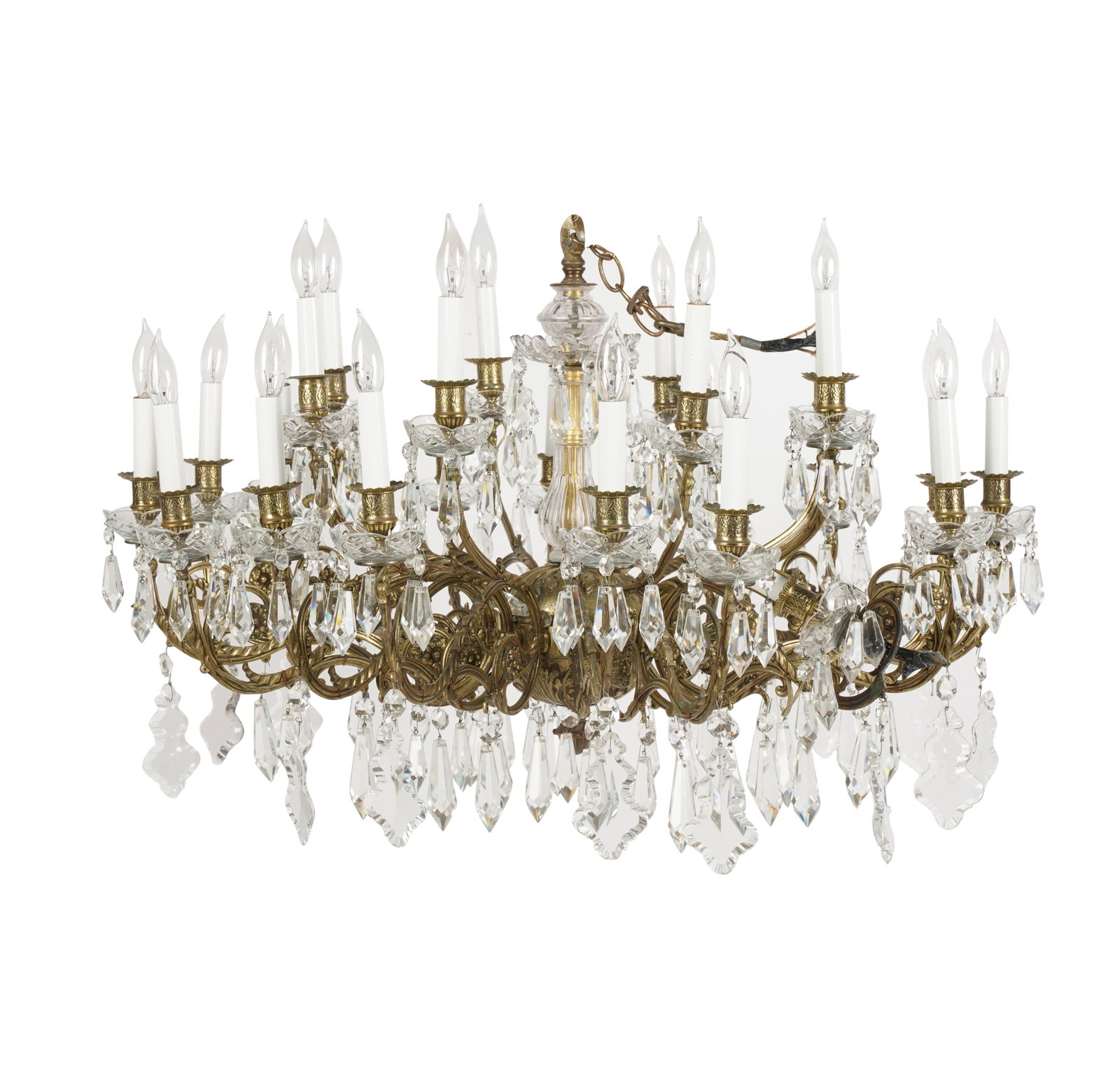 24-Light Brass and Crystal Chandelier: 20th century Excluding chain: 21 x 32 in. (53.3 x 81.3 cm.)
