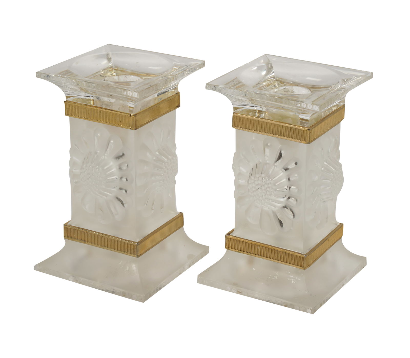 Pair of Lalique Frosted Glass and GIlt Metal Paquerettes Candlesticks: each marked "Lalique France" 5 x 3 1/4 x 3 1/4 in. (12.7 x 8.3 x 8.3 cm.) Provenance: Property from a Glendale, CA Collection