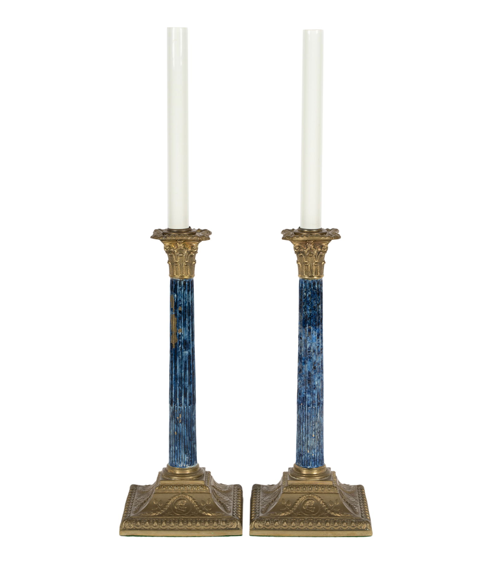 Pair of Neoclassical-Style Faux Lapis Columnar Candlesticks: gilt and painted metal 20 x 5 x 5 in. (50.8 x 12.7 x 12.7 cm.) Provenance: Property from a Southern California Estate