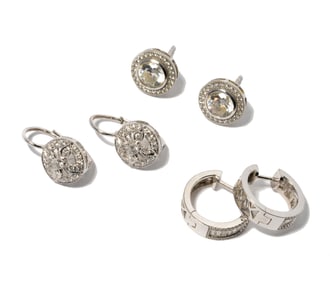 Two Pairs Of White Gold Diamond, and One Pair of Diamond Simulant Earrings