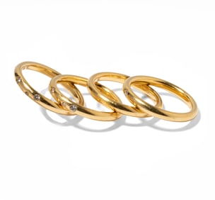 Group of Four 18 Karat Diamond Rings