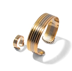 Cartier 18 Karat Gold Diamond Cuff and Stylized Ring