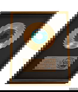 Bernie Taupin's Gold Record for Elton John's Don't Go Breaking My Heart: the plaque inscribed "Presented to Bernie Taupin to commemorate the sale of more than one million copies of the MCA / Rocket Records single record 'Don't Go Breaking My Heart'" Frame: 17 x 13 in. (43.