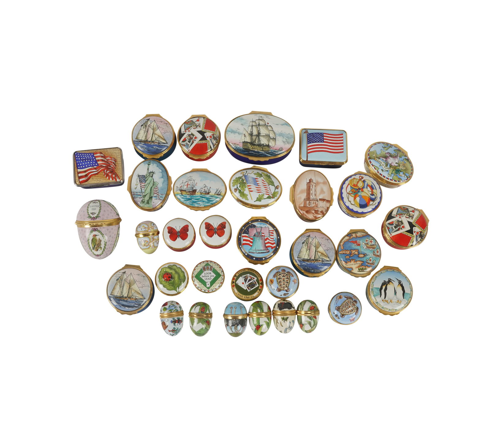 Collection of 30 Halcyon Days Pill Boxes: assorted shapes, sizes and decorations Largest ship box: 1 1/2 x 2 3/4 x 2 in. (3.8 x 7 x 5.1 cm.)
