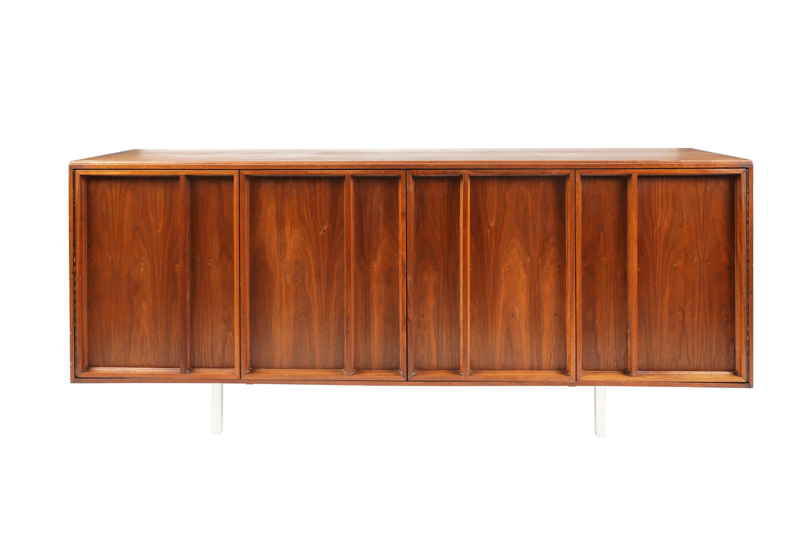 Brown Saltman Mid-Century Credenza: with two hinged two-part doors 30 x 72 x 19 in. (76.2 x 182.9 x 48.3 cm.)