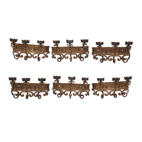 A Set of Six Wrought Iron Wall Lights