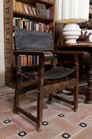 A Spanish Baroque Walnut and Leather Armchair